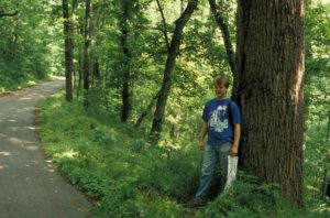 Photograph of Richard at edge of woods